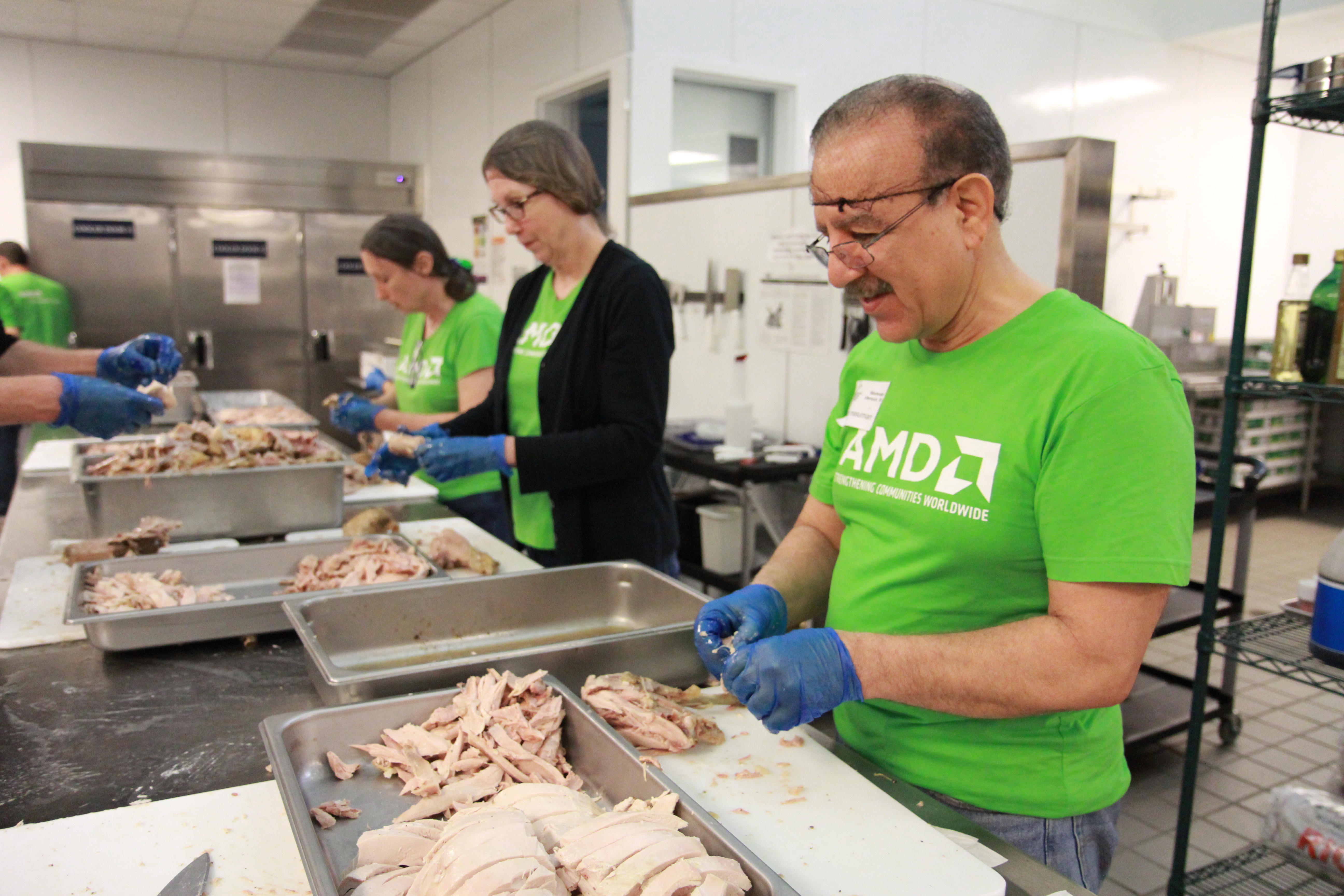 AMD Staff Volunteer in Food Bank Kithcen
