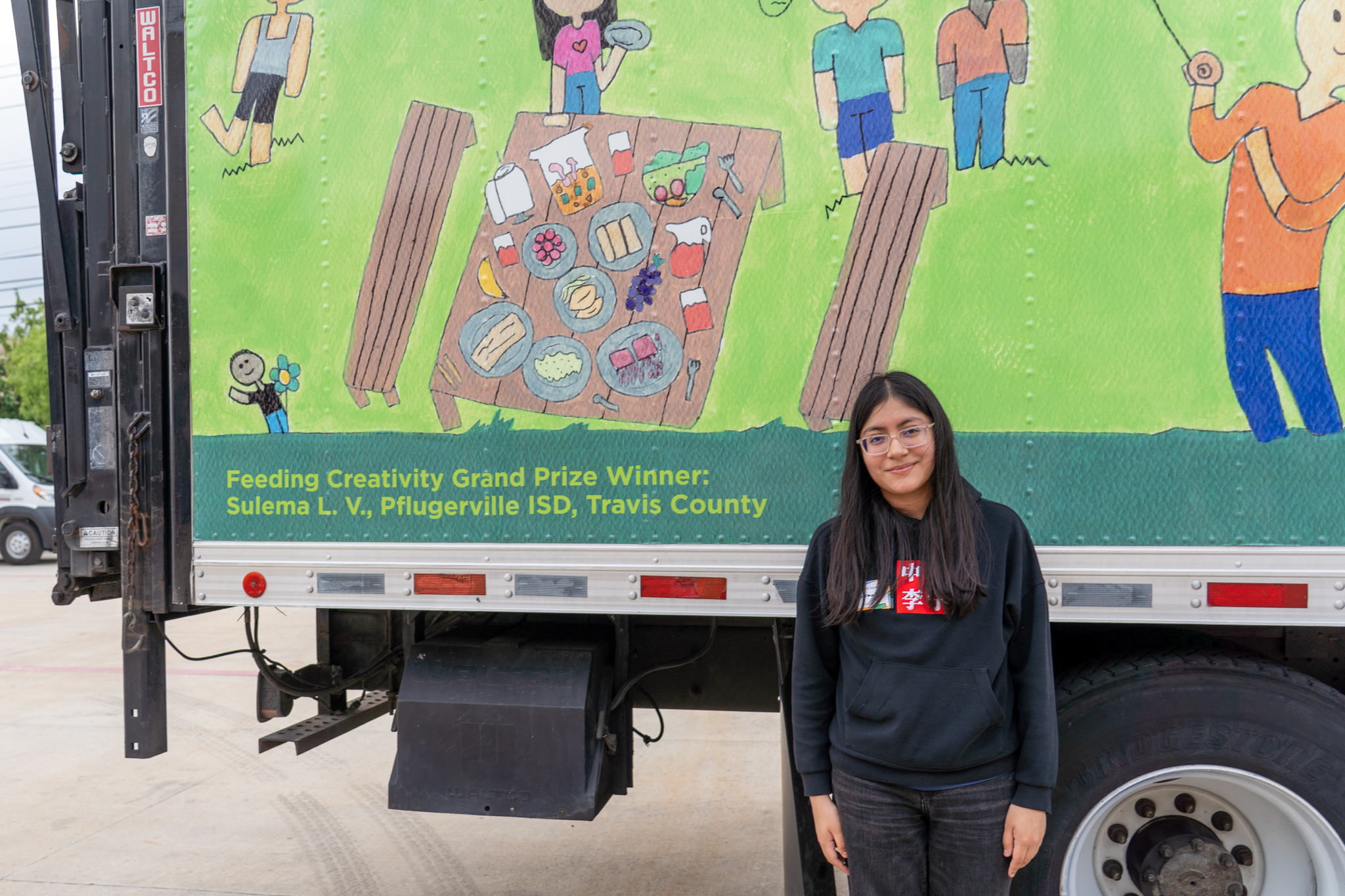 Sulema in front of truck