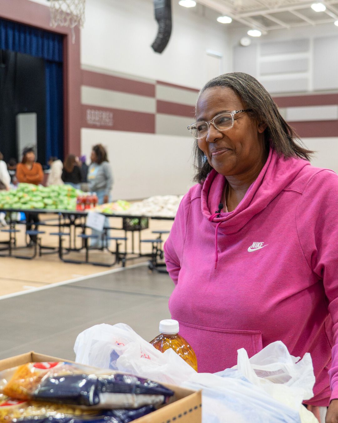 Neighbor visits The Healing Project distribution.