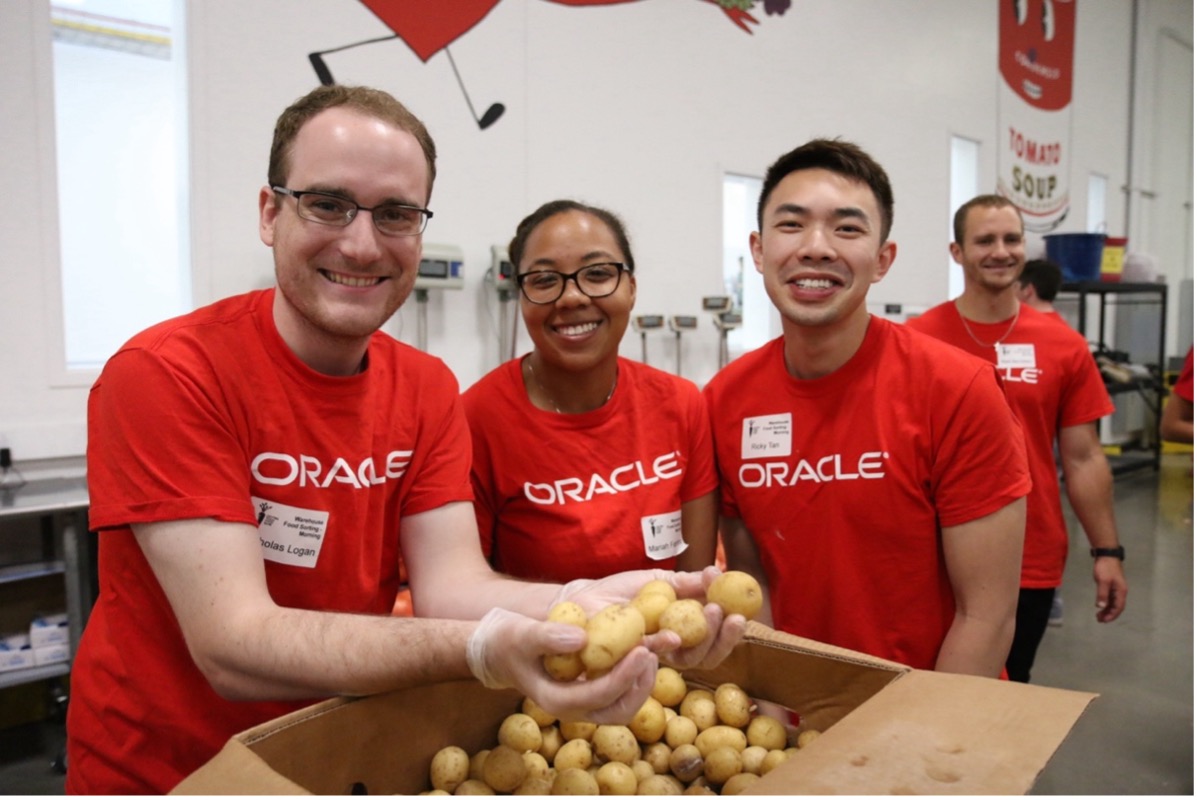 Oracle employees volunteering in the CTFB warehouse.