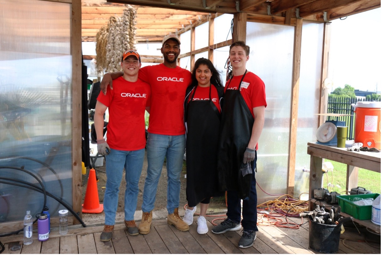 Oracle employees volunteering in the CTFB garden