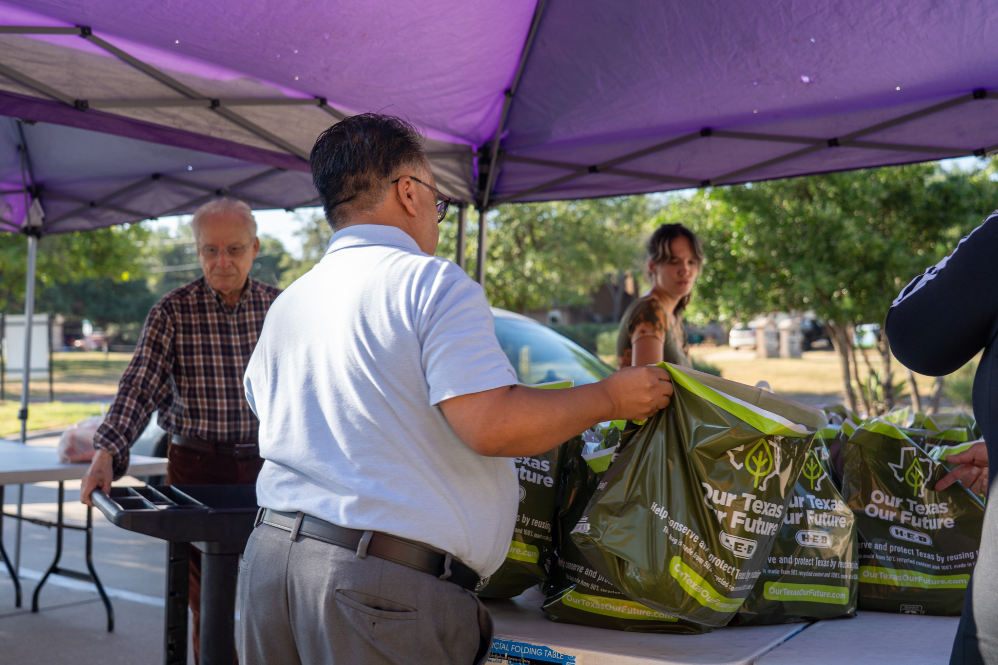 Volunteers and staff working together