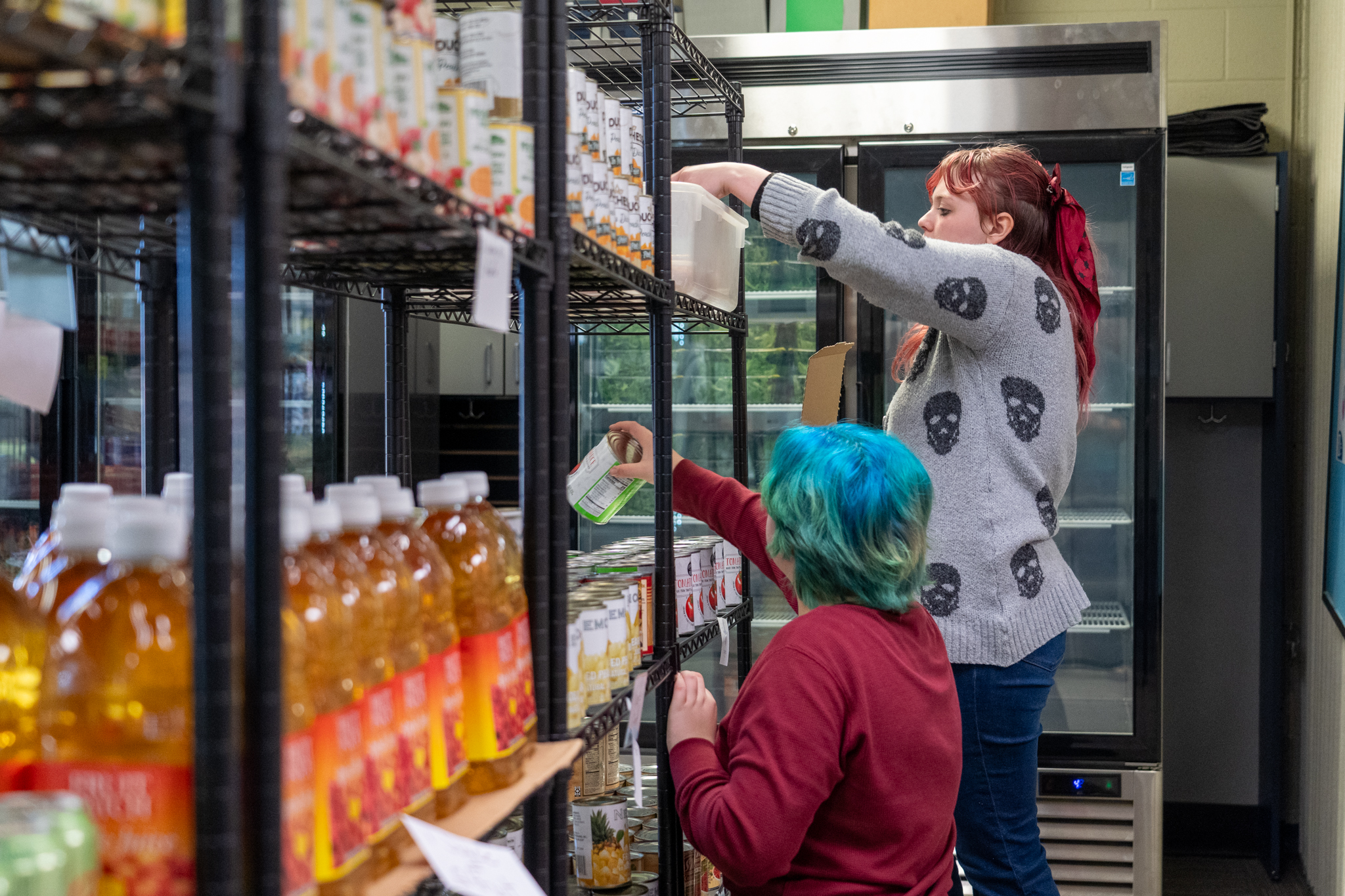 Students stocking market at Gatesville ISD's Stinger Stash a CTFB Feeding Futures School Pantry program