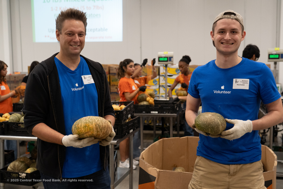 Apple volunteers in Central Texas Food Bank's sort warehouse 2025