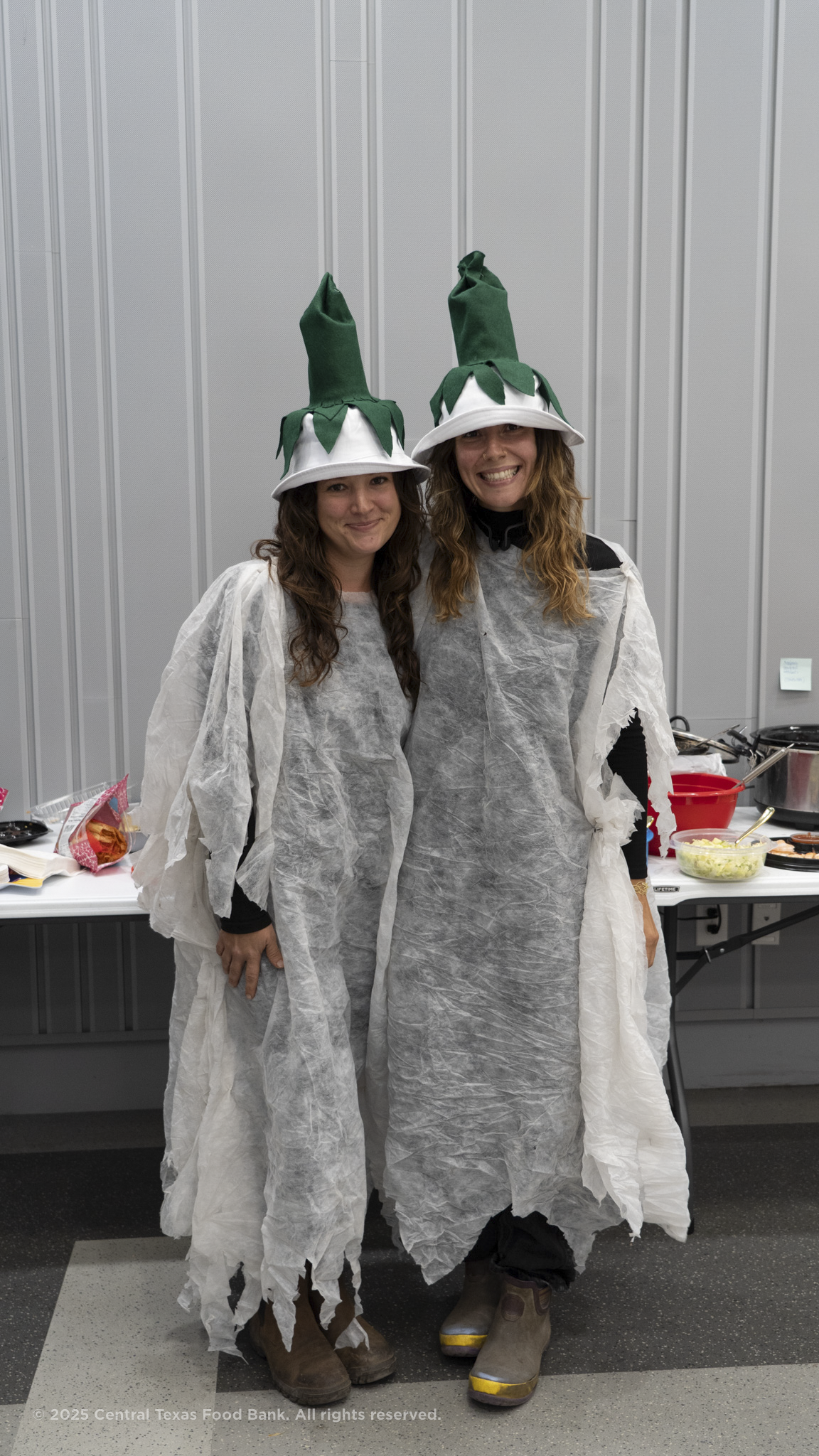 CTFB Garden Coordinator Ollie with manager at staff halloween party dressed as a ghost pepper