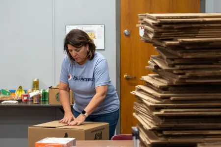 CTFB community partner City of Austin packing food donations