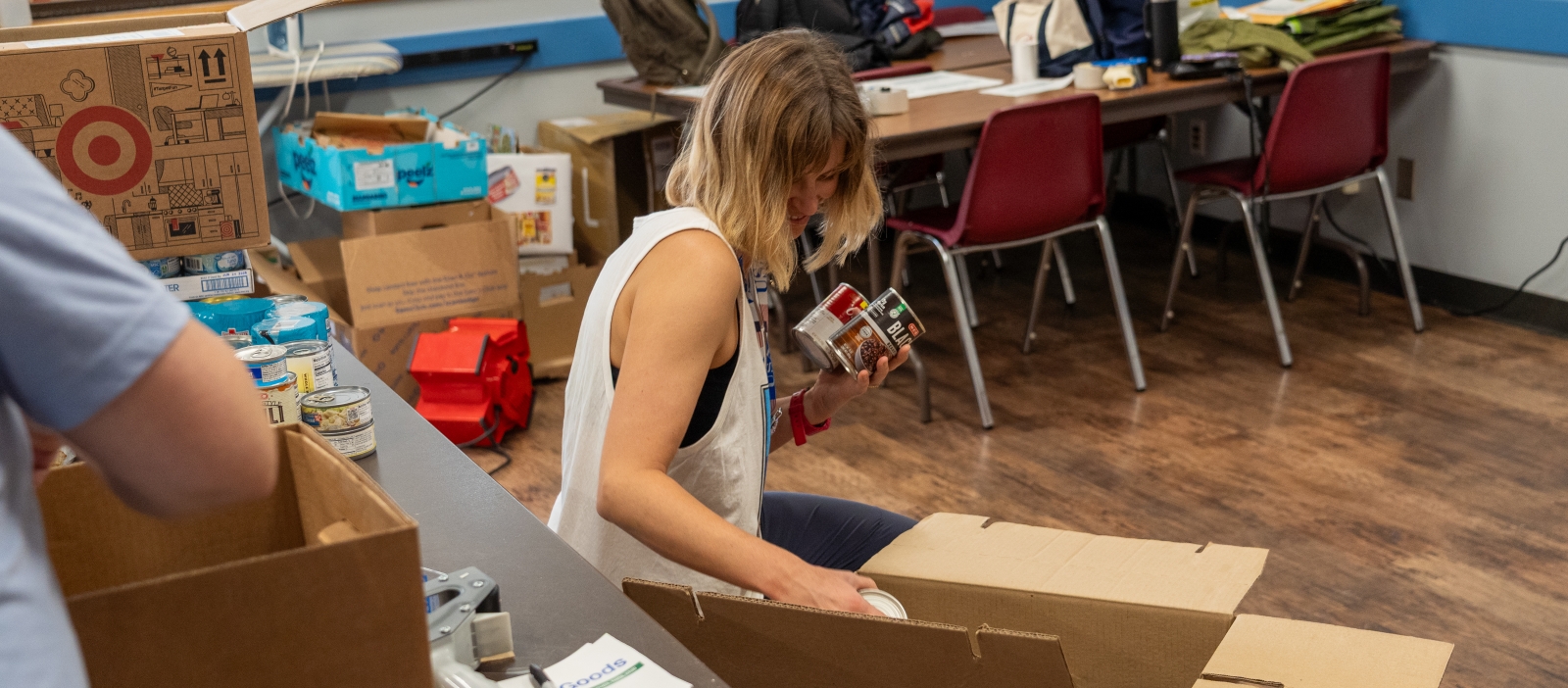 CTFB community partner City of Austin packing food donations